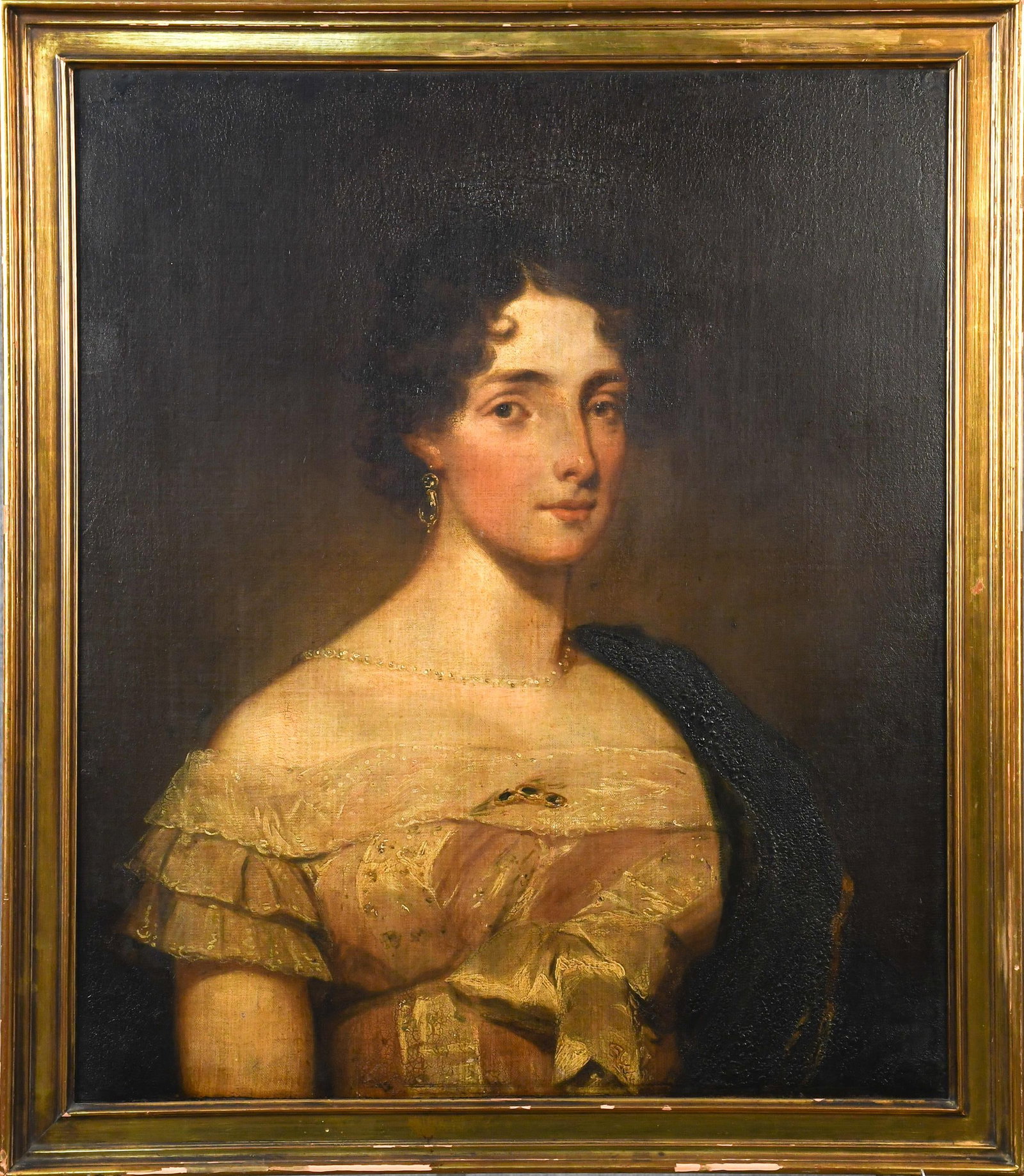 19TH C. ENGLISH PORTRAIT, STYLE OF THOMAS LAWRENCE.: An early 19th C. oil on canvas, depicting a young woman with dark curled hair, wearing a white lace-trimmed gown, gold drop earrings, delicate necklace, and fur drapery over one shoulder, against a