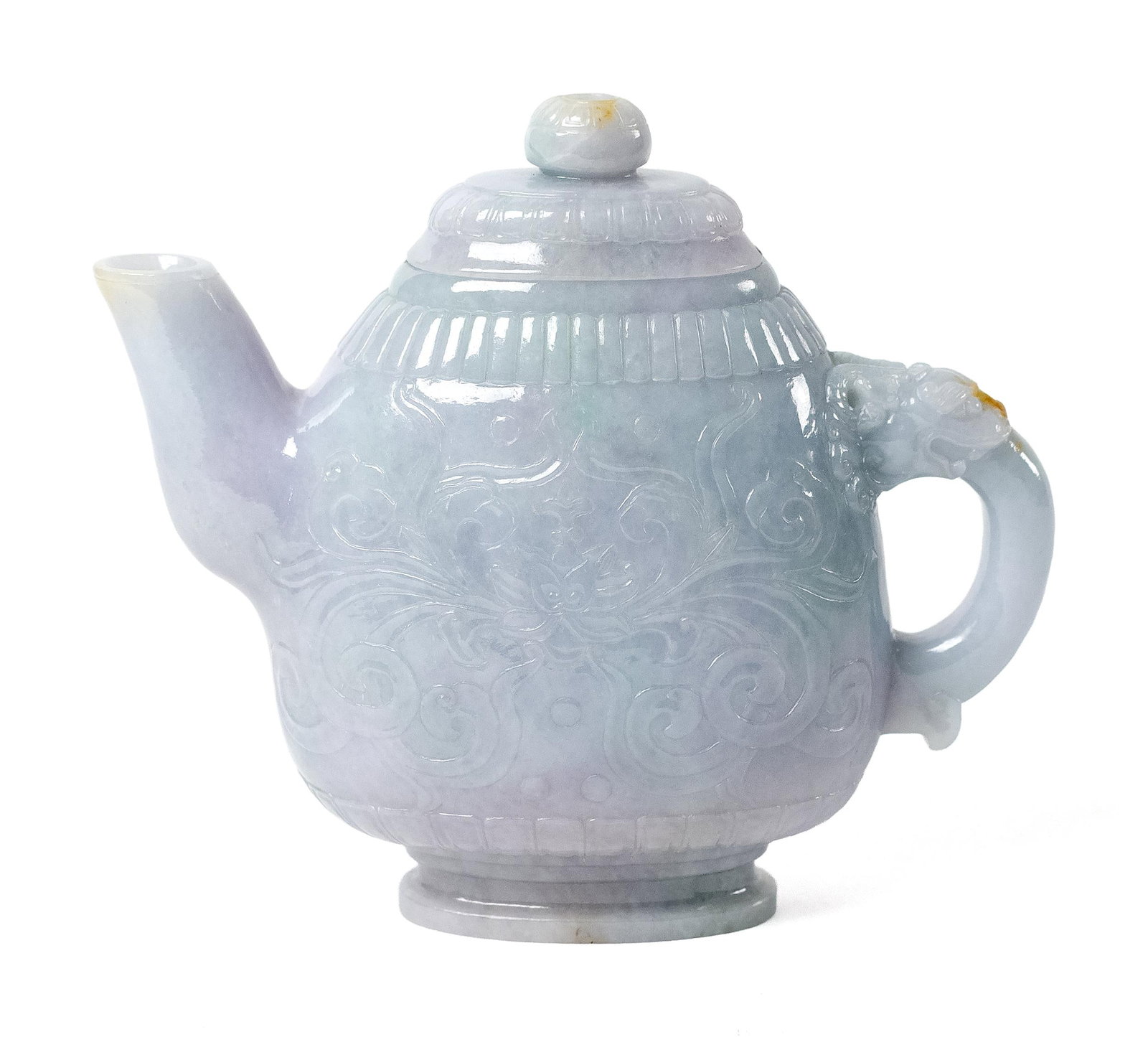 REPUBLIC LOTUS CARVED WHITISH-CELADON JADEITE TEAPOT.: A 20th C. Jadeite teapot and cover with all over ‘Lotus’ decoration, 6.5”H x 7”W. Provenance: 2025 Bonhams Lot # 127, Private American Collection,Ralph M. Chait Galleries, New 