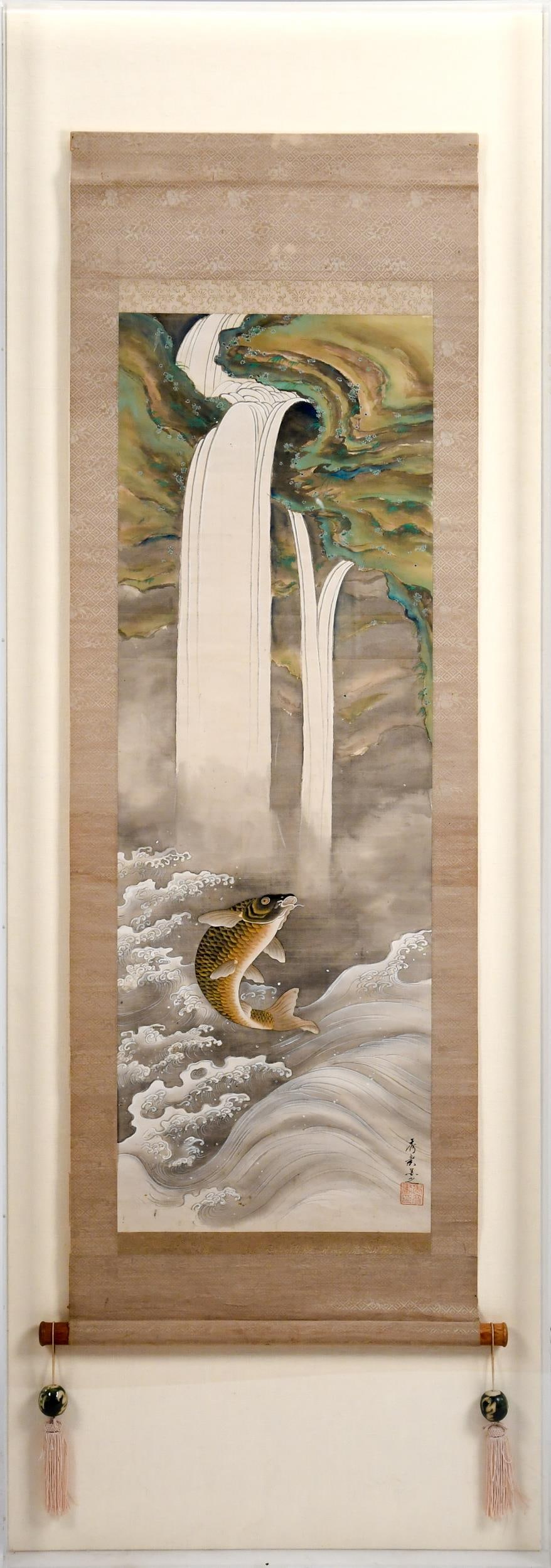 ANTIQUE CHINESE SCROLL PAINTING, IN SHADOWBOX.: A good antique Chinese watercolor scroll painting on silk, depicting a carp leaping from stylized waves, towards twin waterfalls, signed with characters marks in red ink. In a custom made Lucite shado