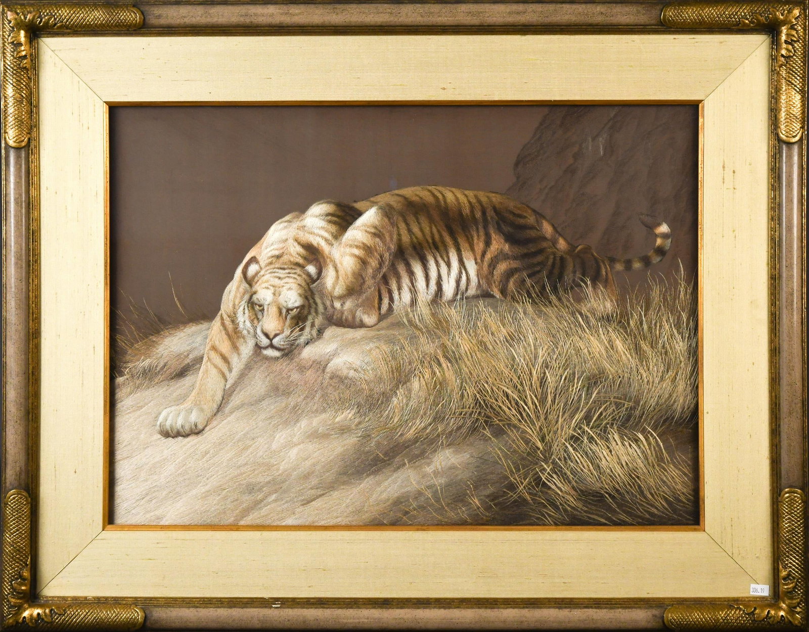 S. NISHIMURA SILK EMBROIDERY, TIGER.: An early 20th C. Japanese Meiji finely worked silk embroidery depicting a tiger among grasses and rocky terrain, rendered in subtle shades of brown, cream, and black. Label on the back indicates it wa