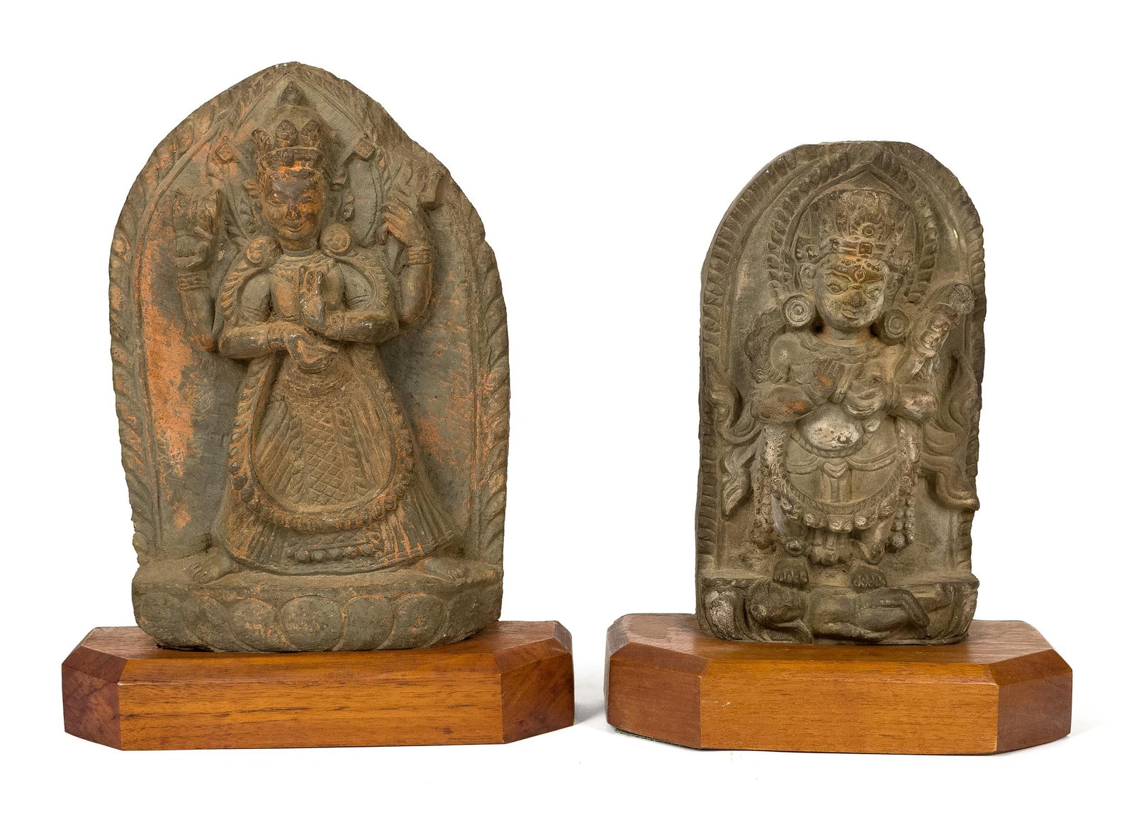 TWO 17TH/18TH C. CARVED STONE STELES.: Two early carved grey stone steles, both depicting figures from Nepal or the Himalayan region. Approx. 8” and 9”H.