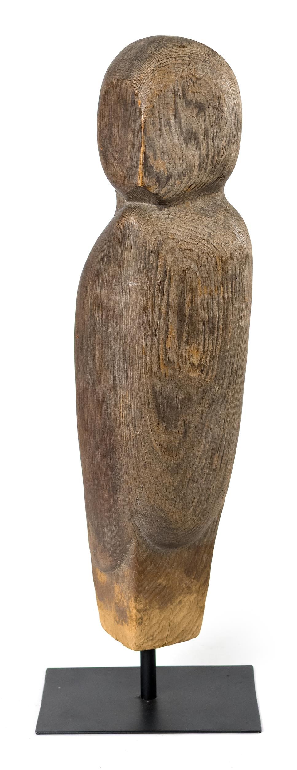 CABOT LYFORD SCULPTURE ON STAND, WOODEN OWL.: A ca. 1980 Cabot Lyford (1925-2016) wooden sculpture on stand depicting an owl in stoic resting position. 26”H on stand.