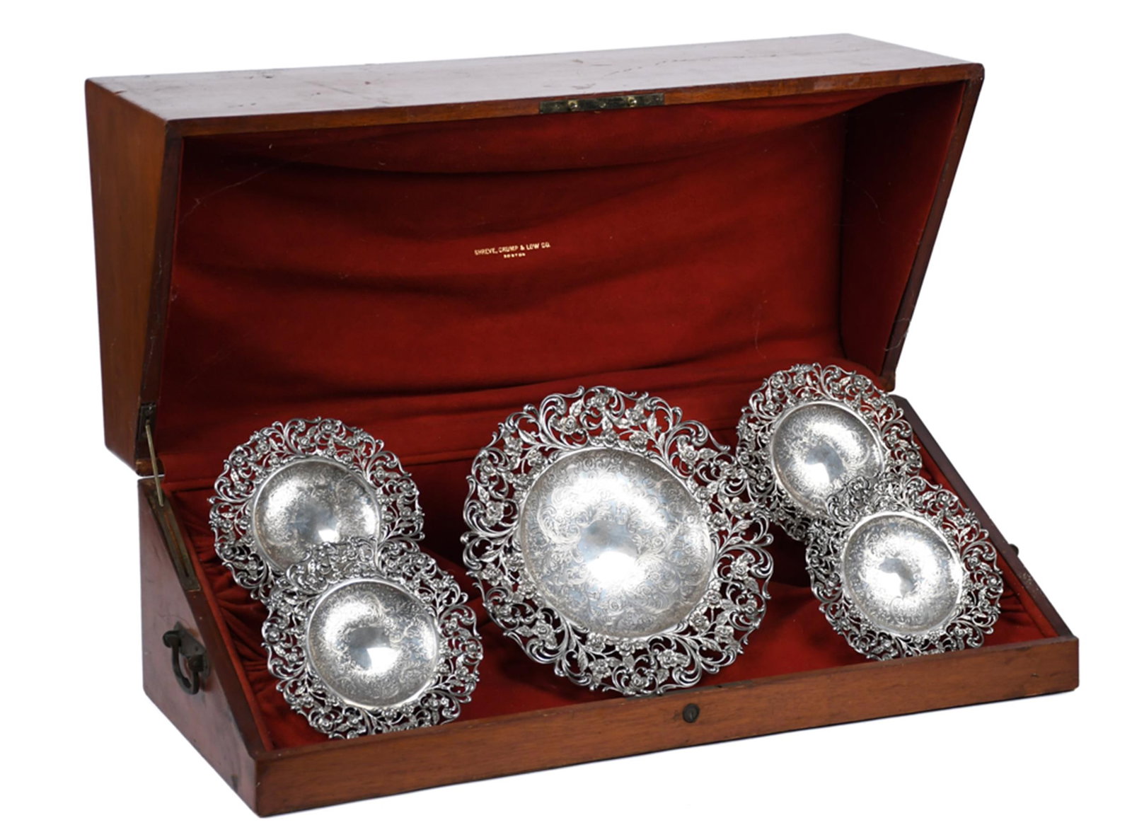 SHREVE, CRUMP & LOW CO. BOSTON STERLING PRESENTATION.: An antique Shreve, Crump & Low Co., Boston, sterling silver presentation set of five reticulated tazzas in original fitted mahogany case. Each tazza features a deeply engraved floral and scroll