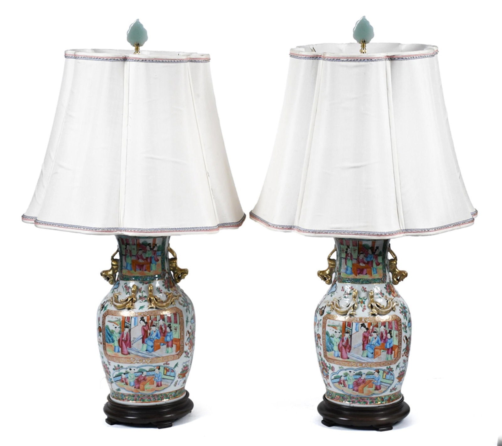 19TH C. CHINESE EXPORT ROSE MEDALLION PORCELAIN LAMPS: A pair of 19th C. Chinese Export rose medallion porcelain table lamps, each of baluster vase form on a fitted wood base. Each neck fitted with applied gilt chilong dragon handles; the body decorated i