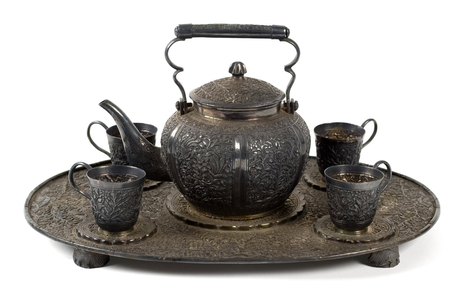 ASIAN 999 EXPORT SILVER TEA SET, 6PCS.: A good six-piece Asian '999' marked pure silver tea set with a 7.5”H handled teapot, 16.5”W tray, and four 2”H cups. 64 oz t.