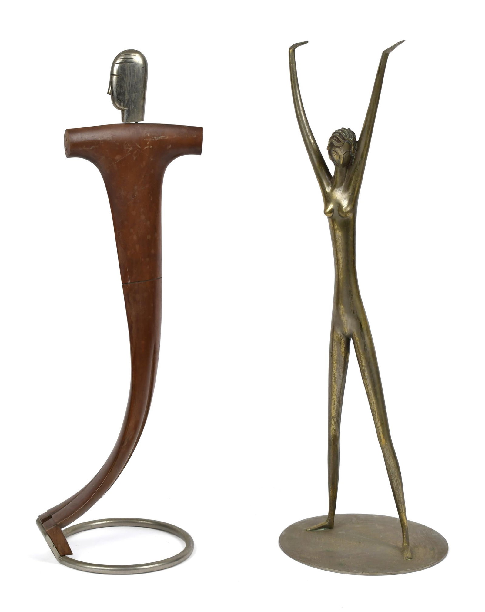 TWO ART DECO AUSTRIAN FIGURES, HAGENAUER.: A nickel plated brass female nude 18”H signed on the the bottom WHW Made in Austria, and a wood and 17.5”H chrome male figure, signed Austria.