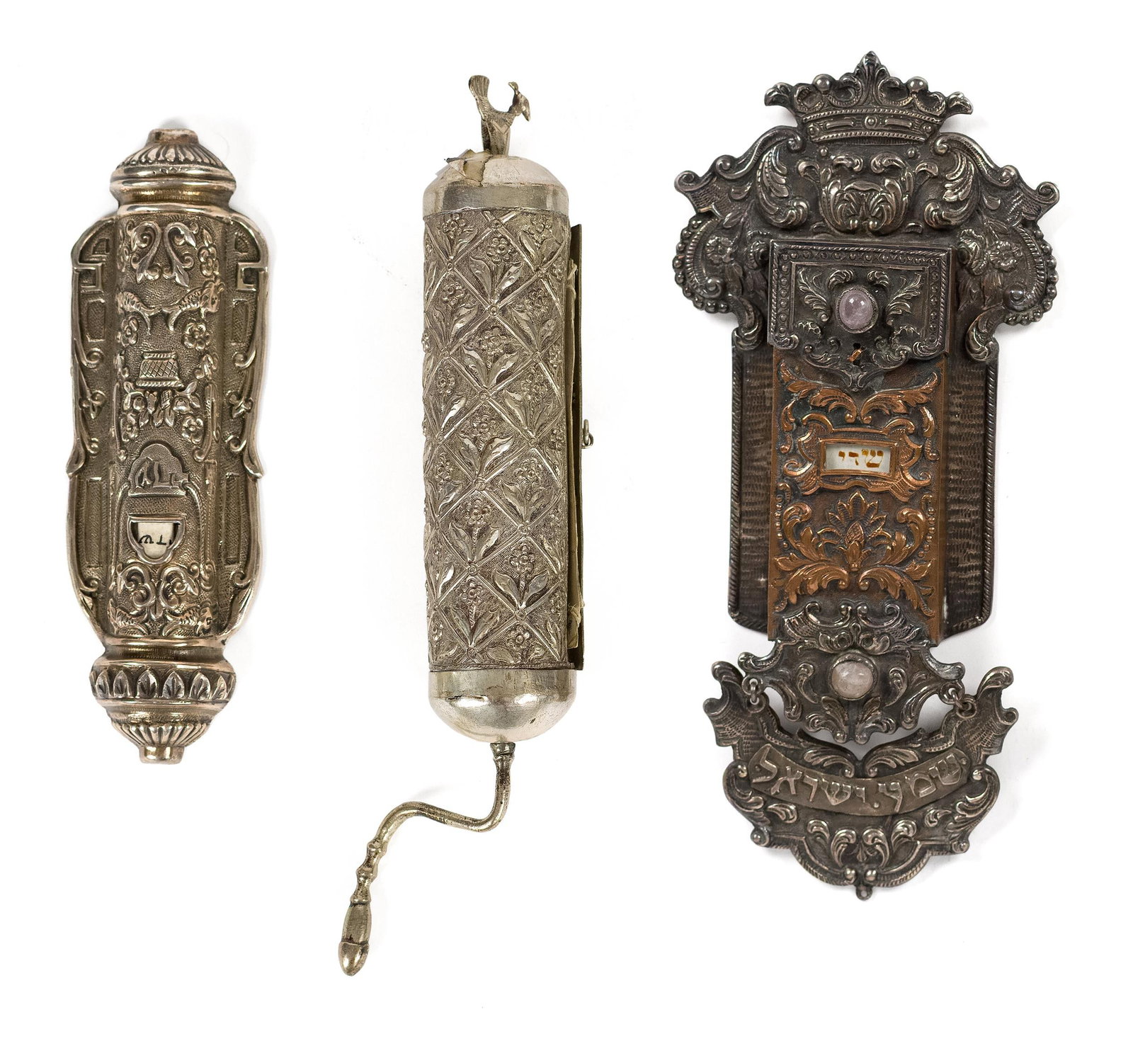 SILVER MEGILLAH SCROLL, MEZUZAH CASES, 3 PCS.: An antique Megillah scroll (Book of Esther) housed in an ornate metal or silver-plated cylindrical case with a winding crank, 9”L. An antique silver on copper Mezuzah case, with purple stones,