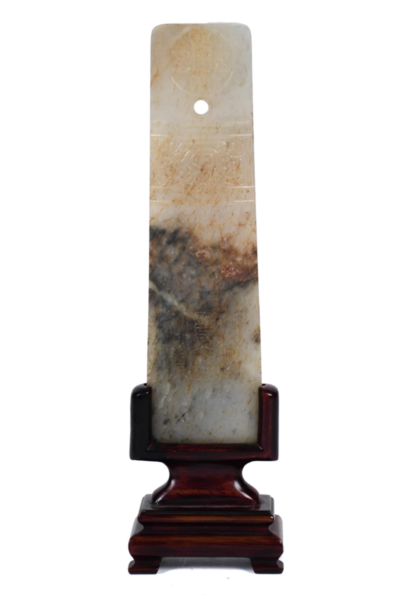 ANTIQUE CHINESE JADE INSCRIBED PLAQUE.: An antique Chinese nephrite jade inscribed plaque, pale celadon-grey with russet and brown calcification throughout, mounted on a carved fitted hardwood stand. The rectangular plaque carved at the top