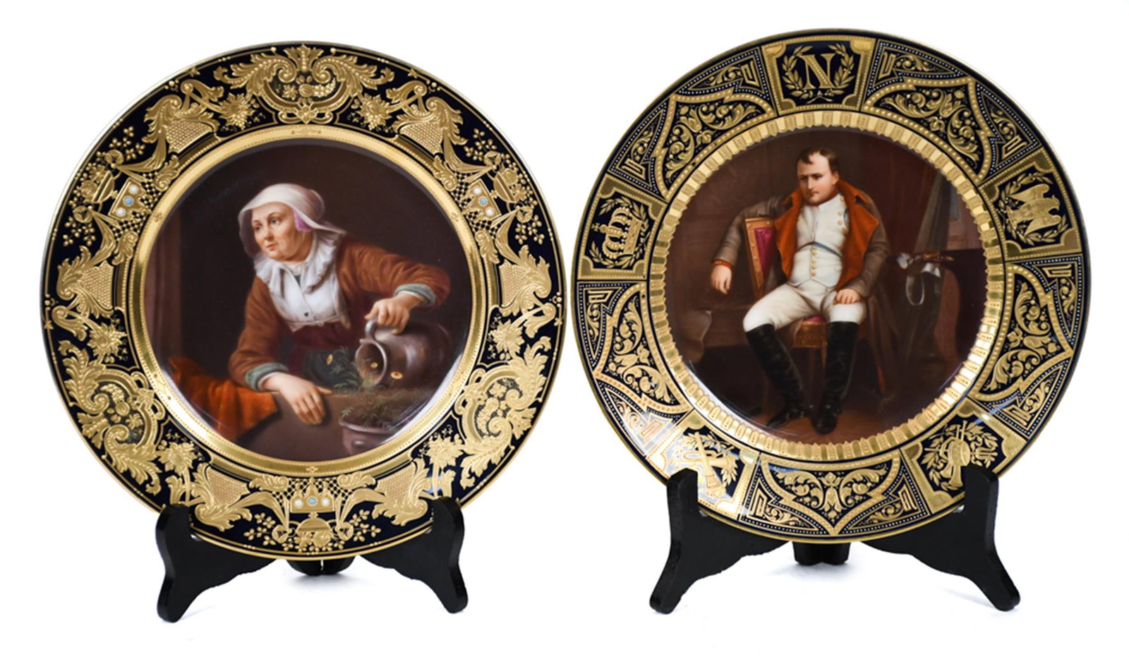 VIENNA PORCELAIN CABINET PLATES, 2PCS.: Two antique KPM Berlin porcelain hand-painted cabinet plates, each marked on the reverse with red beehive mark (Vienna), including:a cobalt and gilt bordered plate depicting Napoleon I at Fontaineblea