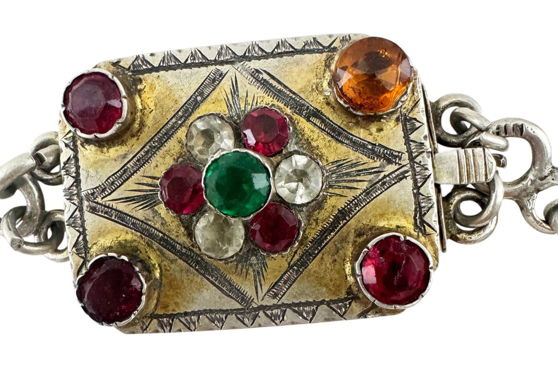 [Jewelry] Silver chain with a buckle decorated with rhinestones and engraving. - Russia, Baltic area: [Jewelry] Silver chain with a buckle decorated with rhinestones and engraving. - Russia, Baltic area (?), 1891. - Length: 108 cm. Weight: 238 g. Silver.