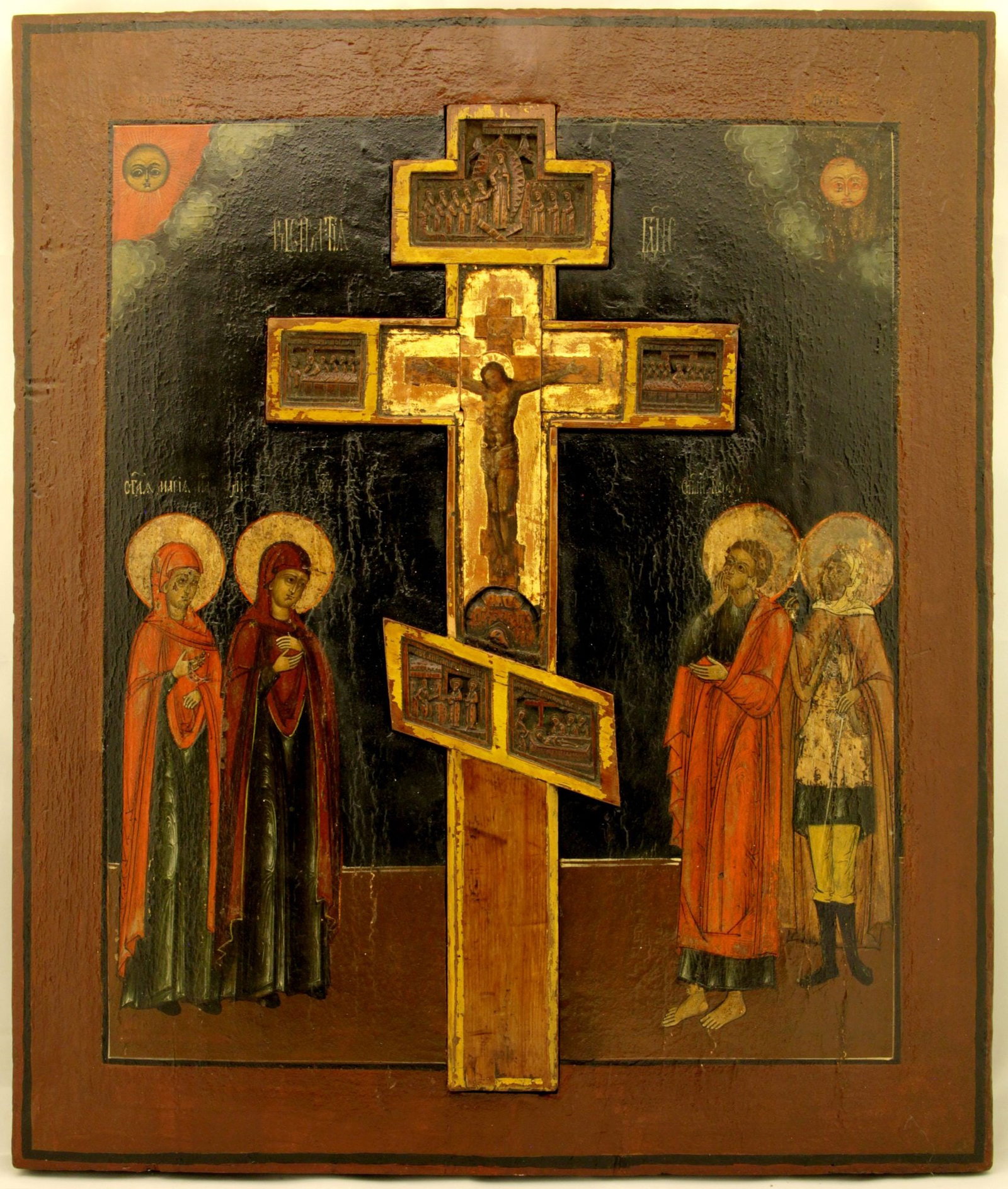 Russian icon "Crucifixion" flanked by selected saints. - Russia, 19th century. - 50x43 cm. (1 of 1)