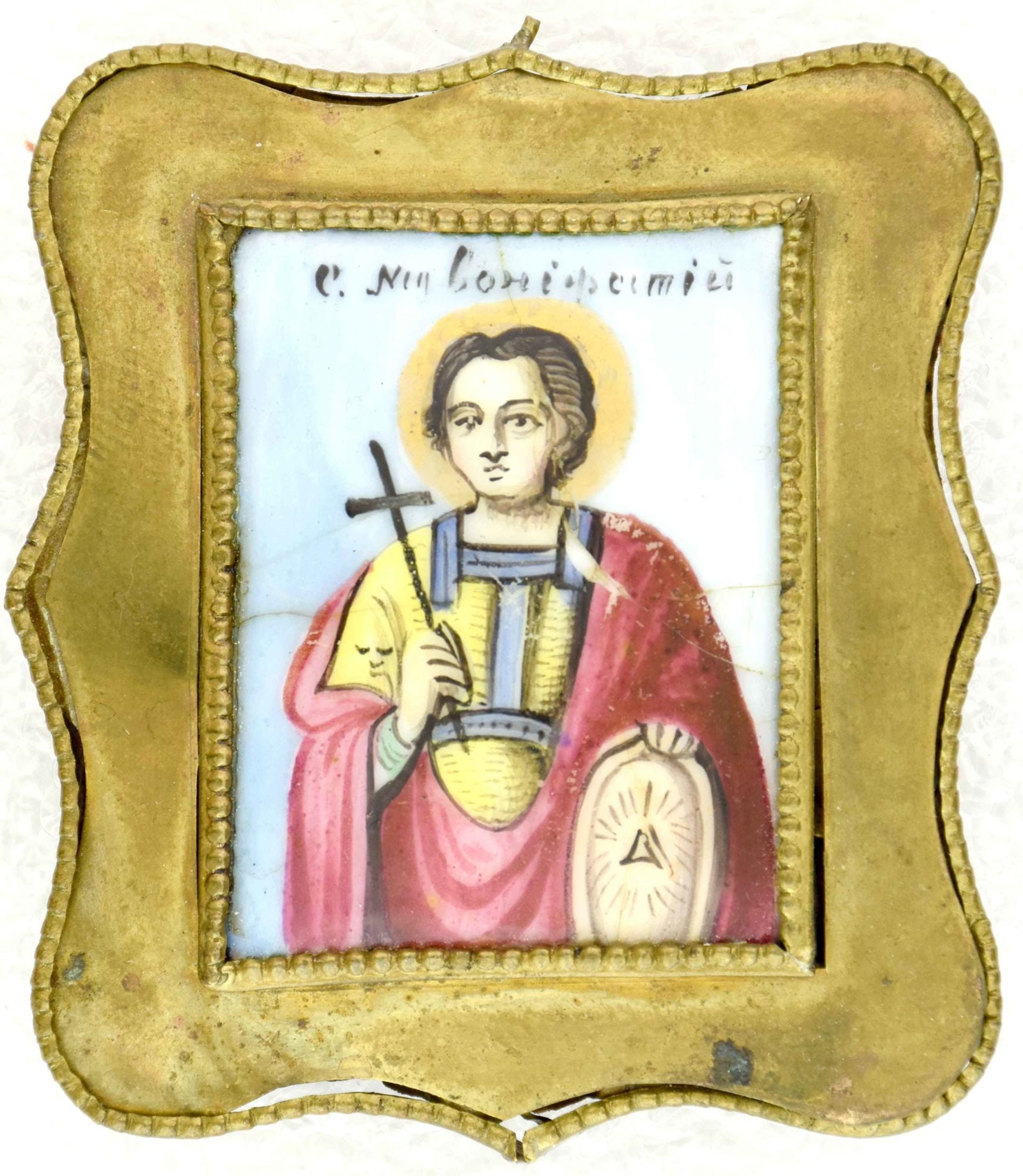 Russian icon, pendant "Saint martyr Boniface". - Russia, 19th century. - 5,2x6 cm.: Russian icon, pendant "Saint martyr Boniface". - Russia, 19th century. - 5,2x6 cm. Finift. Brass.
