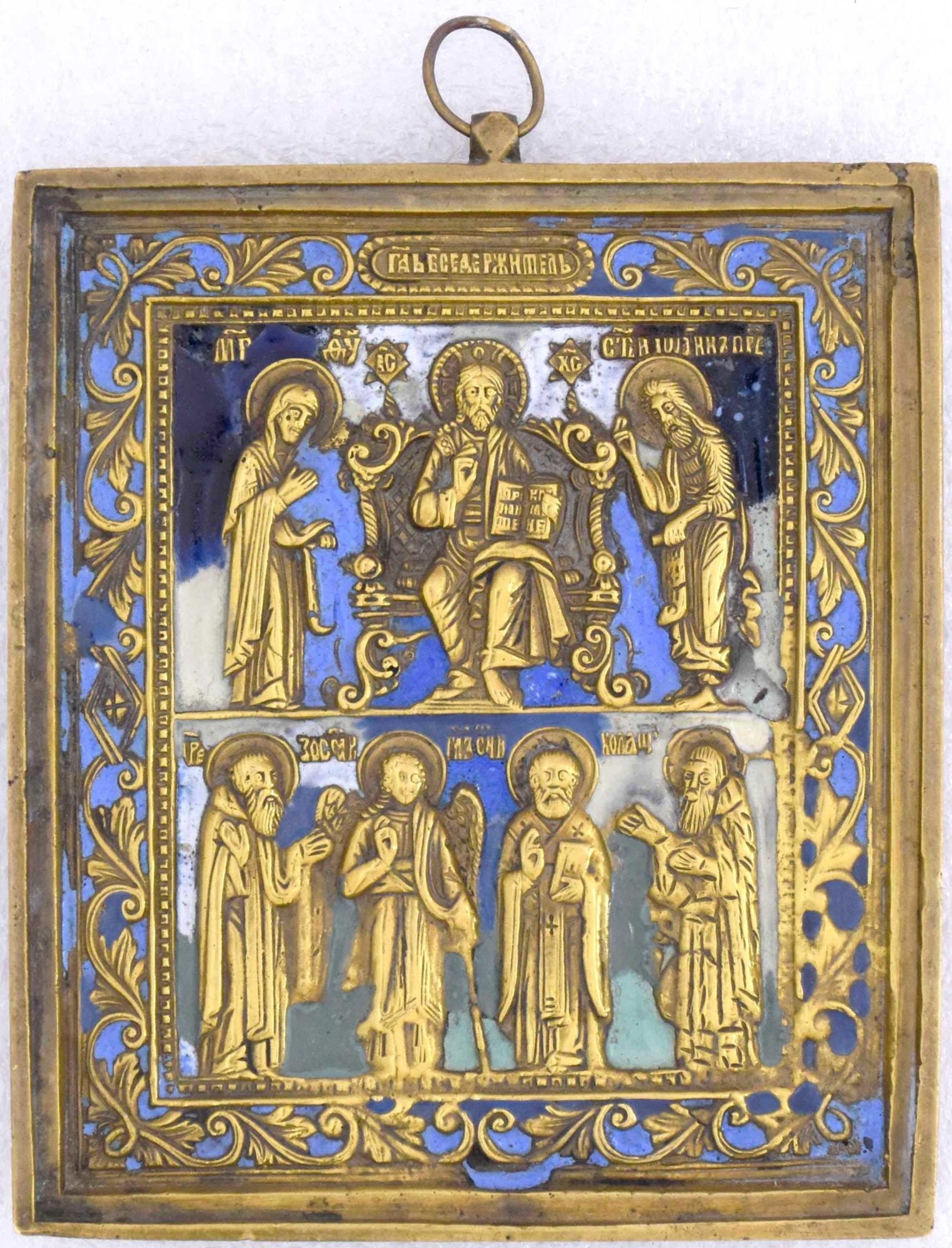 Russian icon "Christ the Almighty" with Deesis and selected saints. - Russia, 19th century. - 9x7,5: Russian icon "Christ the Almighty" with Deesis and selected saints. - Russia, 19th century. - 9x7,5 cm. Brass; gilding. Cast in relief. Enamels (3 colours).