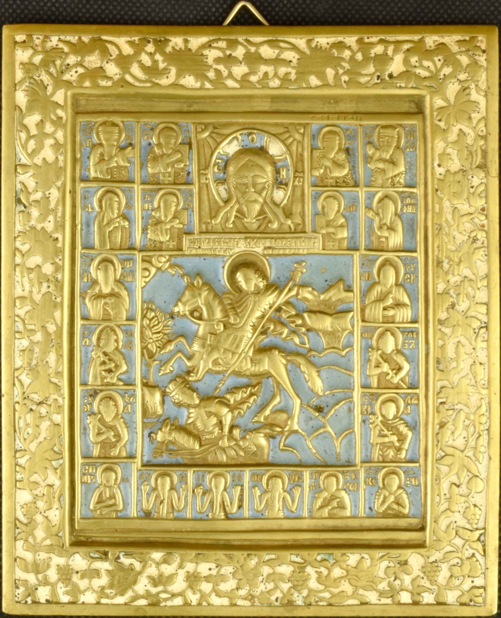 Russian icon "Saint Demetrius of Thessaloniki" with selected saints. - Russia, 19th century. -: Russian icon "Saint Demetrius of Thessaloniki" with selected saints. - Russia, 19th century. - 13,3x16,6 cm. Brass; enamels. Cast in relief.