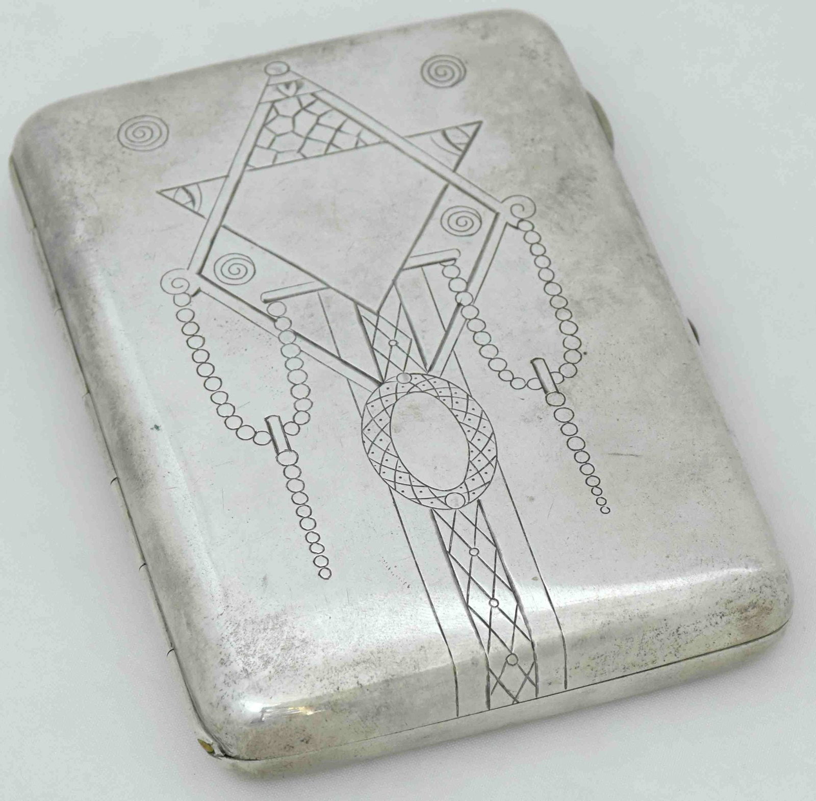 [Russian]. Silver cigarette case with engraved ornament. - Russia, Moscow, 19th century. - 8x11x2 (1 of 5)
