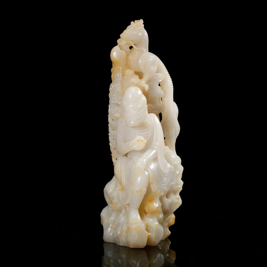CHINESE WHITE JADE CARVED LOHAN: Height: 9.3 inches. Width: 3.3 inches. Thickness: 2.8 inches. Height: 23.5cm Width: 8.5cm Thickness: 7cm Weight: 1329.4g Provenance: From the collections of Mr. Chow estates from Boston, MA.