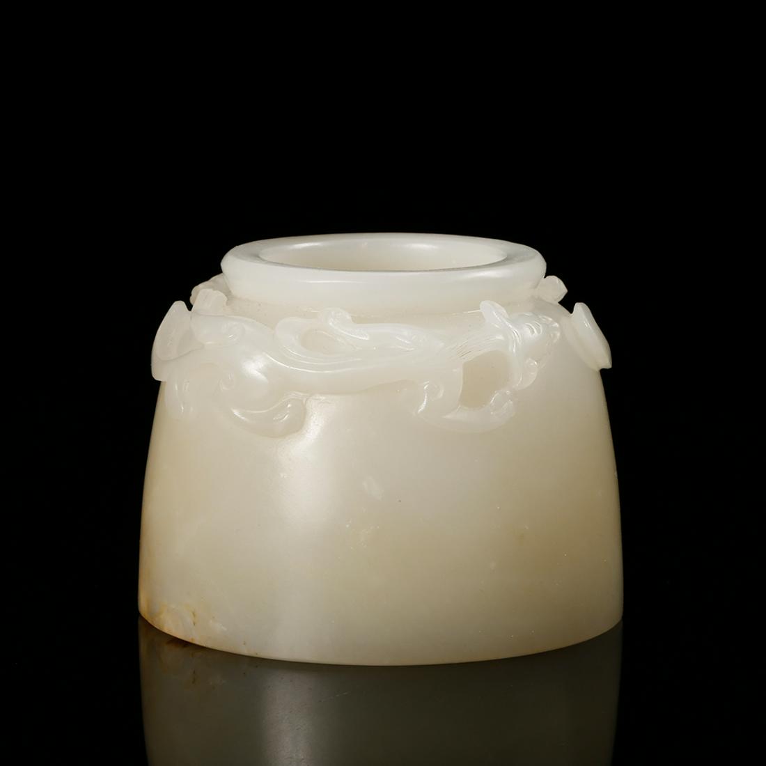 CHINESE WHITE JADE WATER COUPE: Diameter: 2.7 inches. Height: 2 inches. Diameter: 6.8cm Height: 5.1cm Weight: 235.2g Provenance: From the collections of Mr. Chow from Boston, MA.