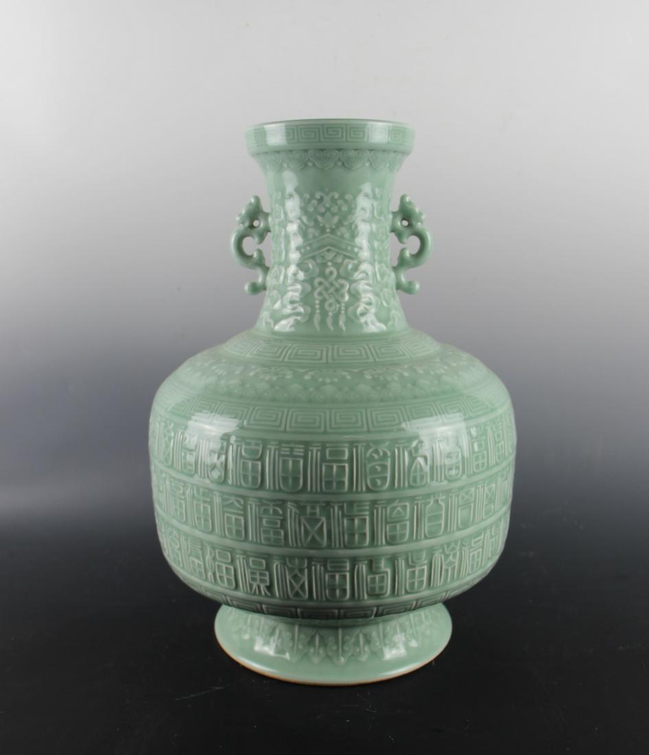 CHINESE CELADON GLAZED PORCELAIN VASE: Height: 17.3 inches. Height: 44cm Provenance: From the collections of Mr. Lam from Pennsylvania.