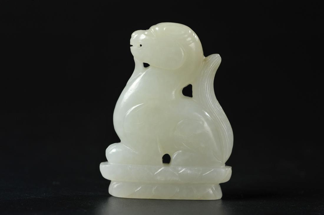CHINESE WHITE JADE CARVED BEAST: Height: 2.2 inches. Width: 1.7 inches. Thickness: 0.6 inches. Height: 5.6cm Width: 4.2cm Thickness: 1.5cm Provenance: From the collections of Mr. Wilson Xu from New York.