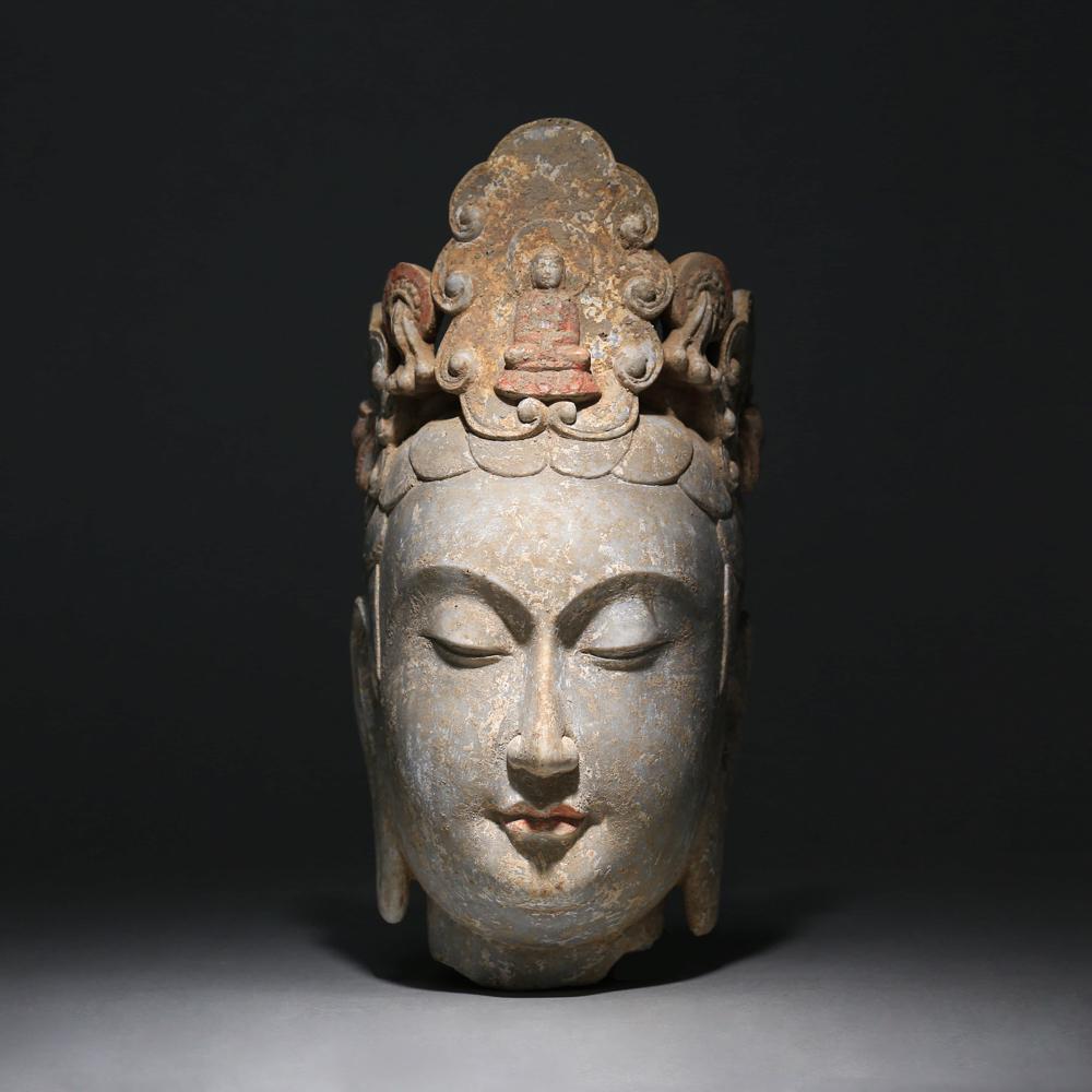 A CARVED BUDDHA HEAD (1 of 9)