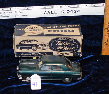 1/25 Ford Custom Sedan Mfc by Aluminum Model Toys Inc.: Oringinal model car of "The Car if the Year" in orinal box. No motor in the car. The car is in great conidition. Doyer Grey.