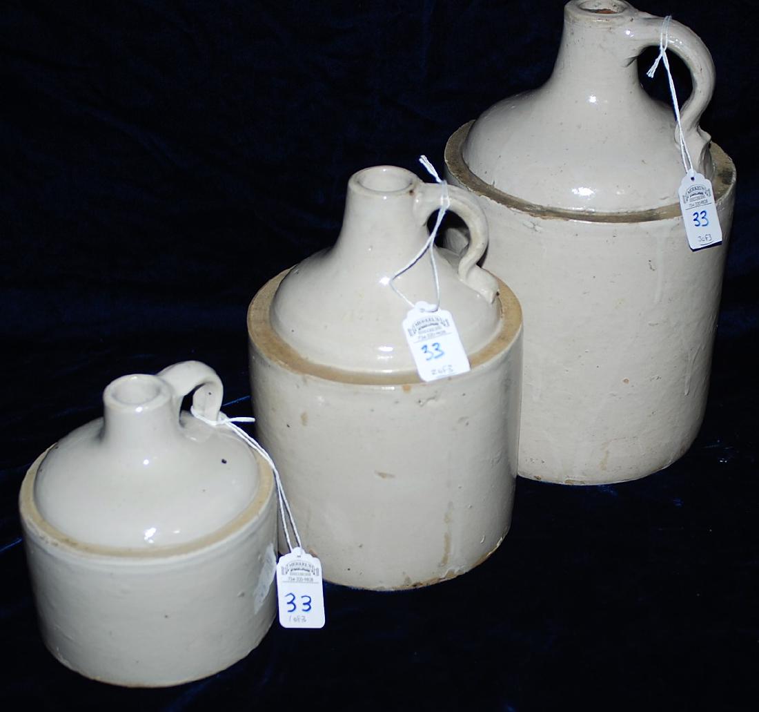 Graduated set of 3 White Glazed Red Wing jugs. (1 of 5)