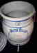 Red Wing five gallon water cooler w/ a blue stenciled 5 - 6