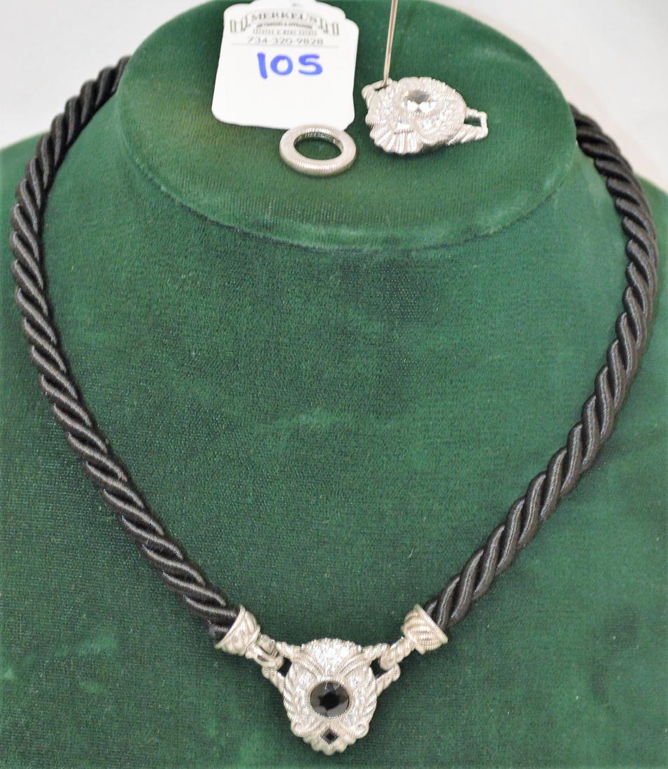 Lot of 3 Judith Ripka Black Spinel pieces: Lot of 3 Judith Ripka Black Spinel pieces. The necklace is 18 inches, with silk rope design, with sterling silver endcaps that are enhancers, clasping the pendant. There is an extra pendant with a cle