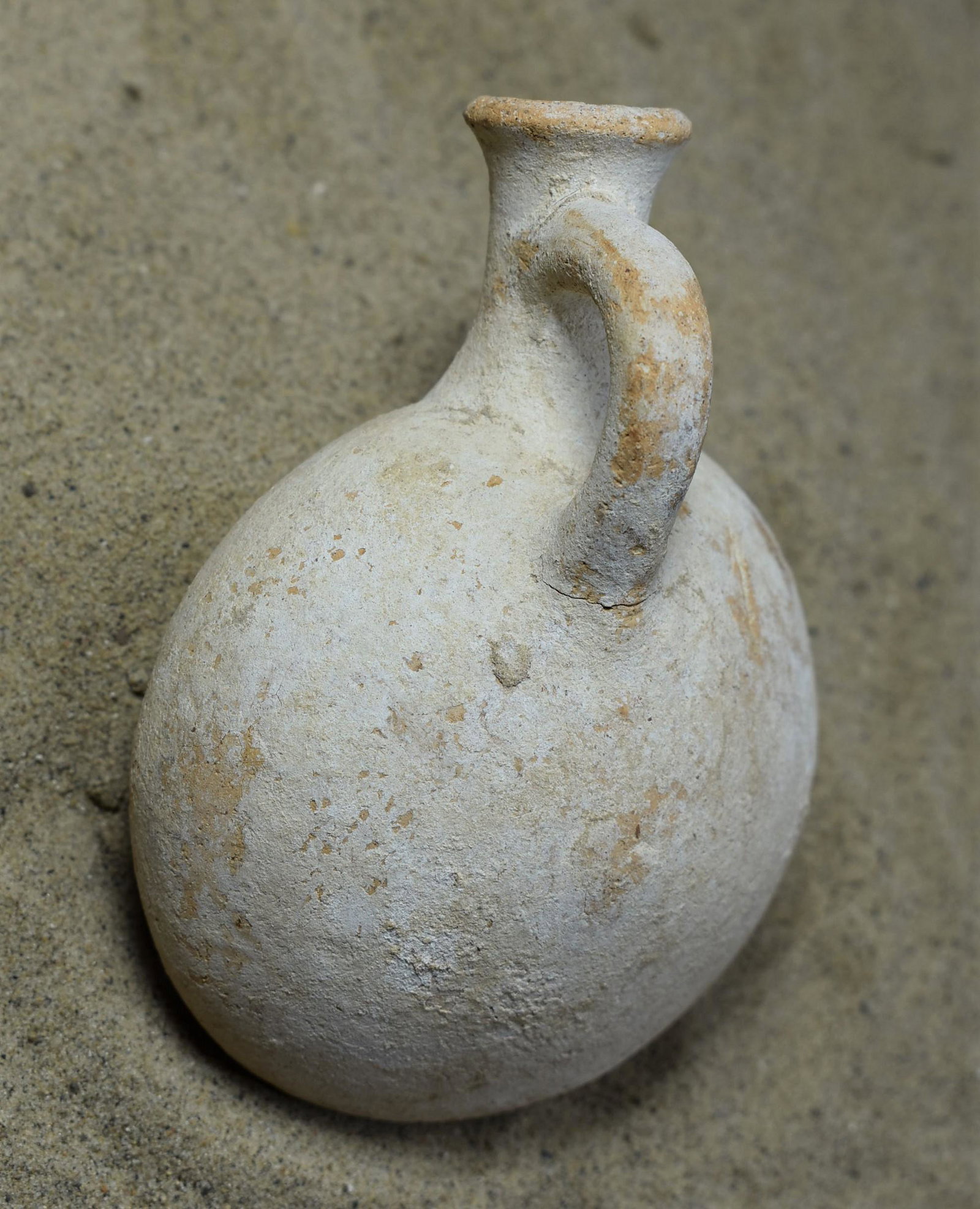Early Iron Age Pilgrim Flask: Early Iron Age Pilgrim Flask, 5.5 in. High. Unusual form and wonderful condition. See attached photos as evidence of condition and details.