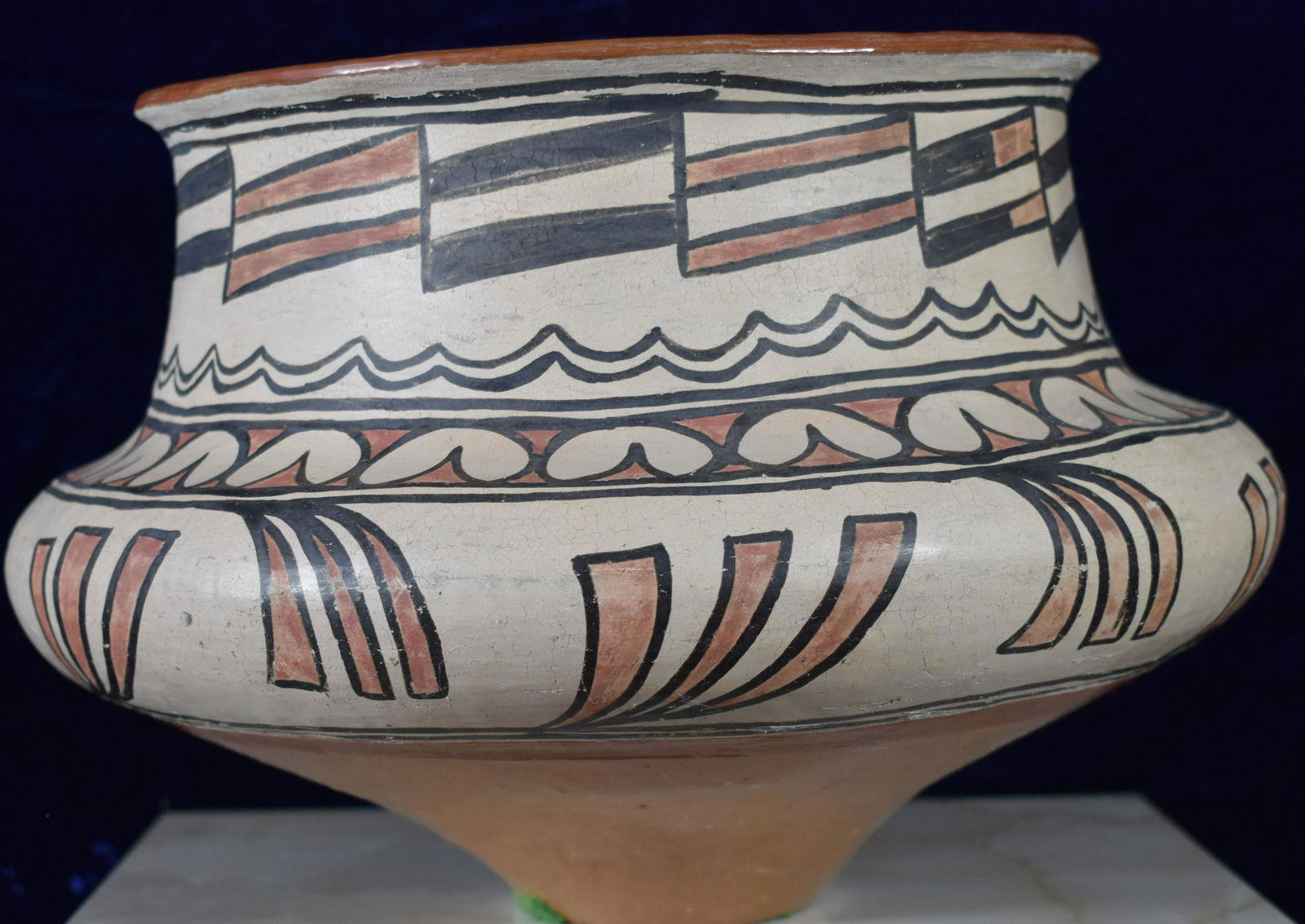 San Ildefonso Polychrome Jar attributed to Tonita Pena: San Ildefonso Tribe Polychrome Jar attributed to Tonita Pena c. 1900. 9 in. H x 12 in. diam. Wide shoulder and narrow base. Acquired from Lucille & Marshall Miller Collection Cat. P744 for $1500 on 3/