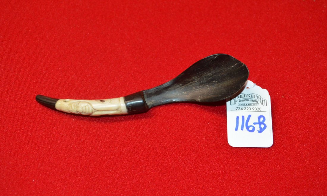 Northwest Coast Carved Spoon Bone & Mountain Sheep Horn: Northwest Coast Carved Spoon Bone & Mountain Sheep Horn.The pin is abalone or mother of pearl. The piece is 5.25 inches long. The handle has a face carved into the top. In 2000, this piece was evaluat