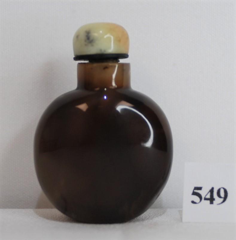19th Century Agate Chinese Snuff Bottle Dark Brown: This bottle is dark brown with a beige stopper and old spoon. 19th century. 2 x 1.25 inches. This was purchased at Jonny’s Antiques Ltd. in Shakespeare, Ontario, Canada on June 9, 1986 for $101.65. 