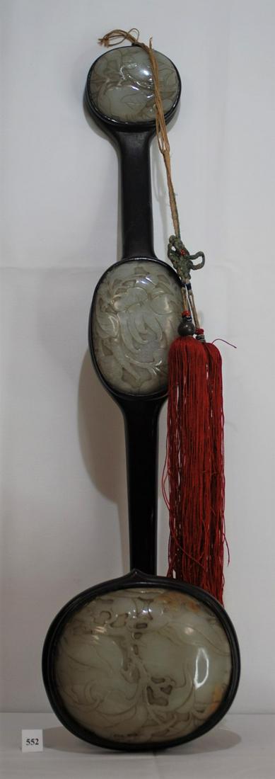 Chien Lung Scepter-3 Jade Insets Chien Lung 1736-1796: The scepter is rosewood with mutton fat jade. This pieces is 24 inches long without the tassel. The jade insets measure: 4.5 x 5, 3 x 4.5, & 3.5 x 2.5 inches. This scepter is from the Ching Dynasty of