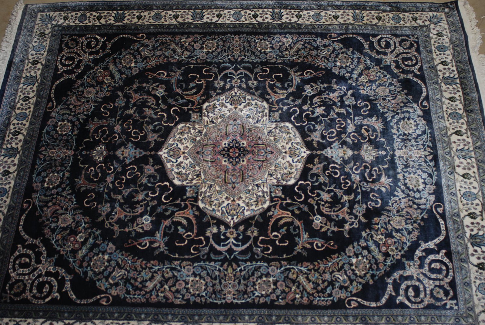 Large Oriental Rug 8 x 10 Feet by Mir in Pakistan: This beautiful 8x10 feet Oriental rug has a Garland Keshan design by the Mir Family Looms in Hyderabad, Pakistan. The family signature is in the rug. The rug was purchased at MirÂ’s Oriental Rugs i