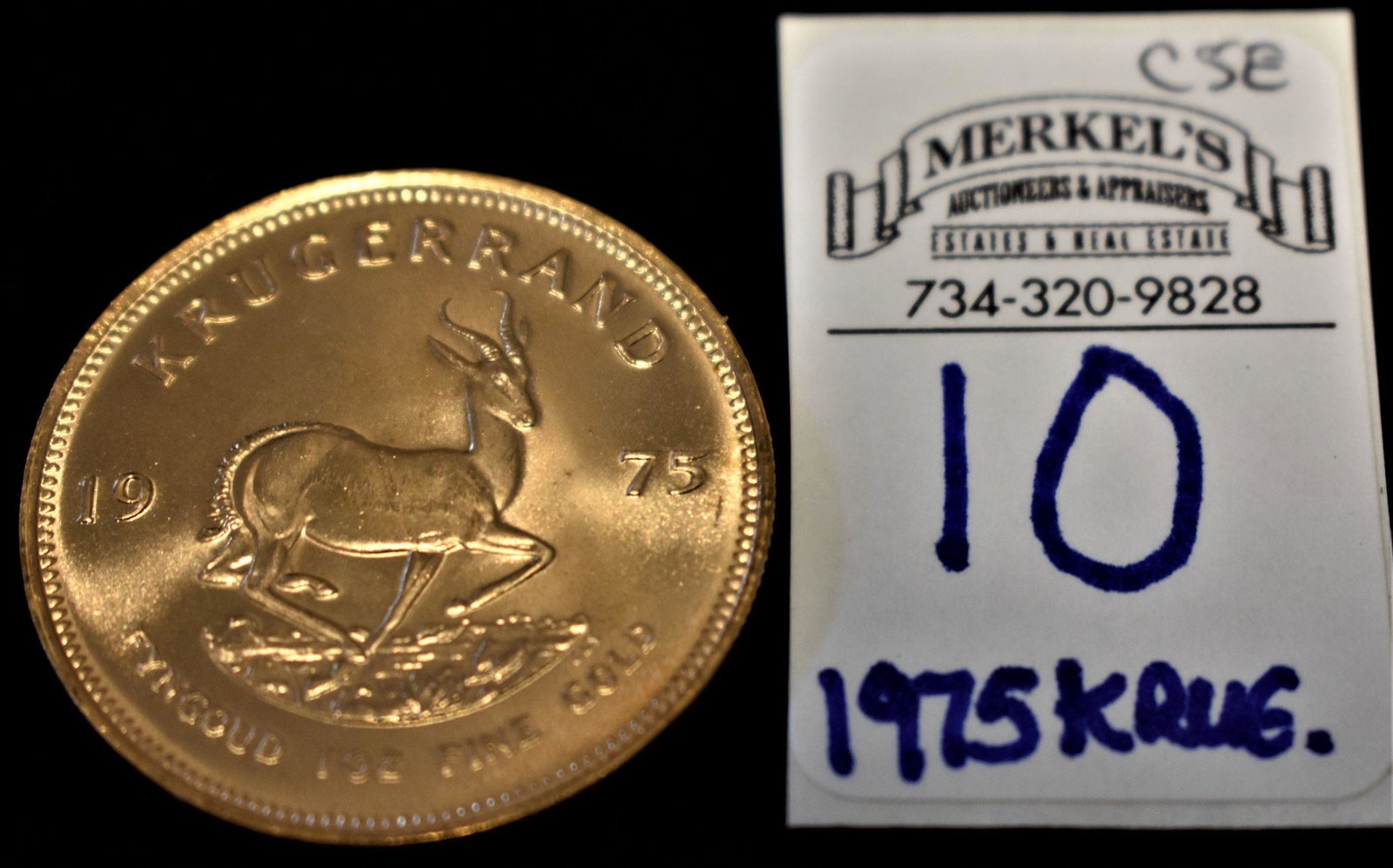 1975 1oz Krugerrand Gold Coin BU.: 1975 1oz Krugerrand Gold Coin BU. Please see Photos for details of this coin. Photos of each coin lot are of the exact coin you shall receive if you are the winning bidder. Each Coin Individually Phot
