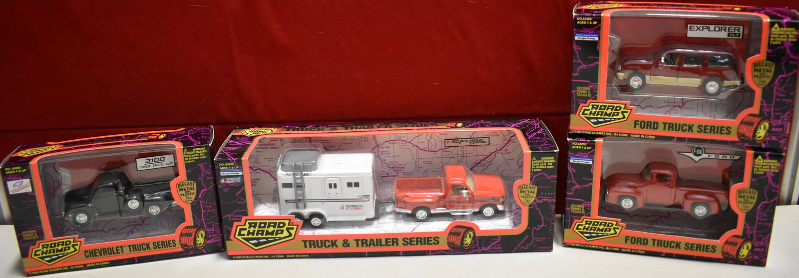 Lot of 4 1/43 Road Champs Models: 1/43 Road Champs Truck and Trailer Series F-150 Flare Side and Featherlite Trailer 64260, 1953 Chevrolet 3100 Pick Up 64805, Ford Explorer XLT 64205 & Ford F-100 64205. Factory New Condition, See atta