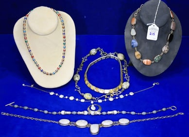 Lot of 7 Sterling Silver Necklaces with various stones.