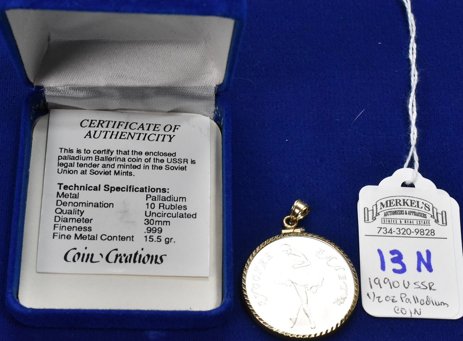 1990 USSR 1/2ozt .999 Palladium 10 Rubles Ballerina in 14kt Yellow Gold Bezel: 1990 USSR 1/2ozt .999 Palladium 10 Rubles Ballerina in 14kt Yellow Gold Bezel. This coin measures 30mm in Diameter, is Uncirculated, and comes in a 14KT CC marked Yellow Gold Bezel with Slider Loop. T