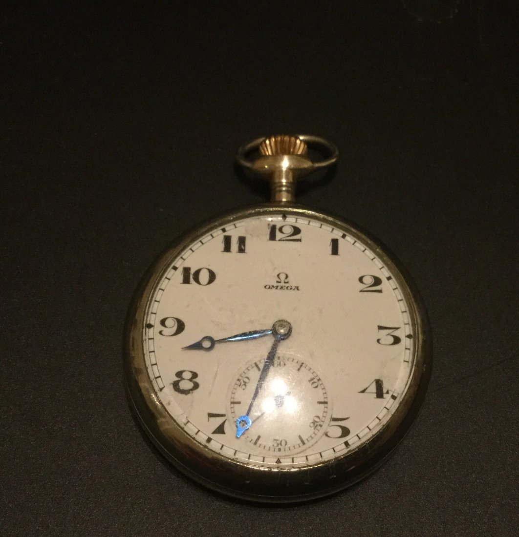 Antique omega Jewel Pocket watch: MEASURES 2" X 2.75"