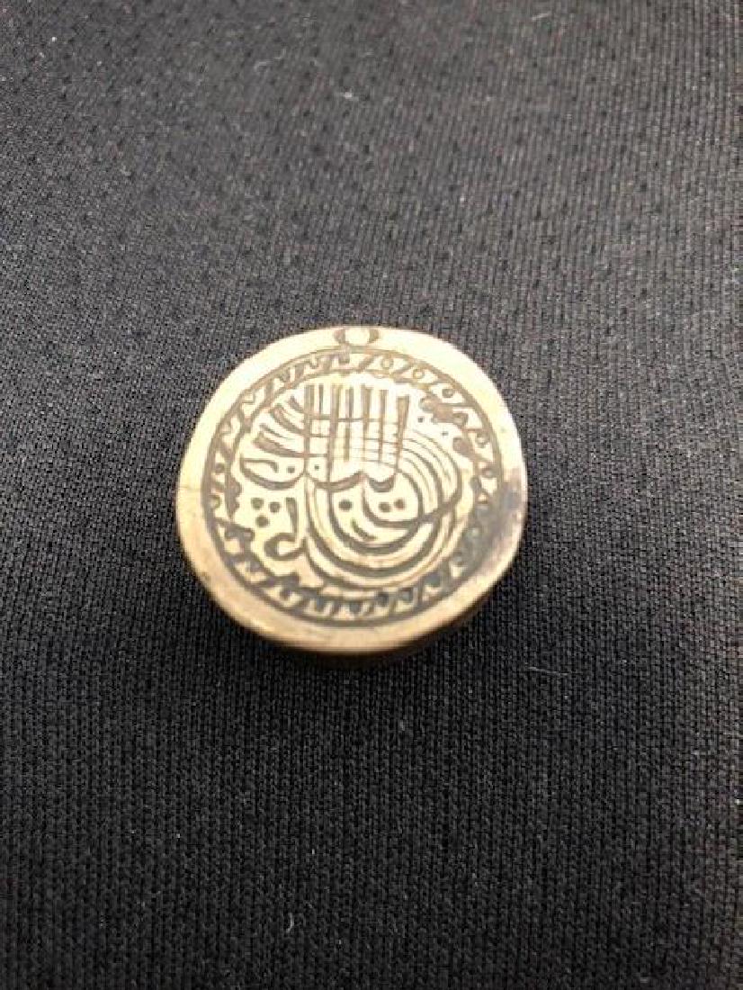 Bronze scale Seal with islamic Inscription: Bronze scale Seal with islamic Inscription, Length 1 CM. Location: United States, Beverly Hills
