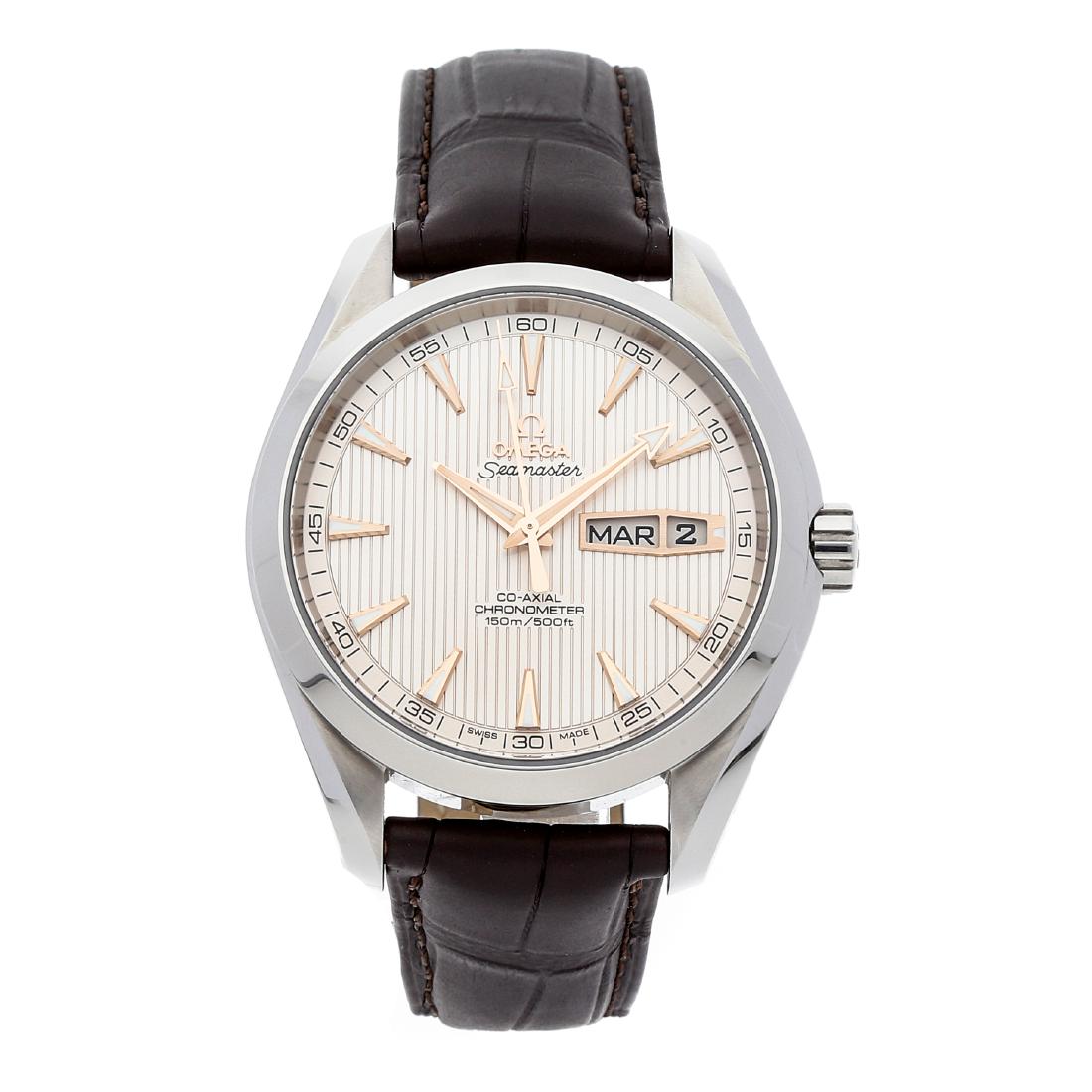 OMEGA SEAMASTER AQUA TERRA 150M ANNUAL CALENDAR: Pre-Owned Omega Seamaster Aqua Terra 150m Annual Calendar self-winding automatic watch, features a 43mm stainless steel case surrounding a silver Teak dial on a brown alligator strap with a stainless