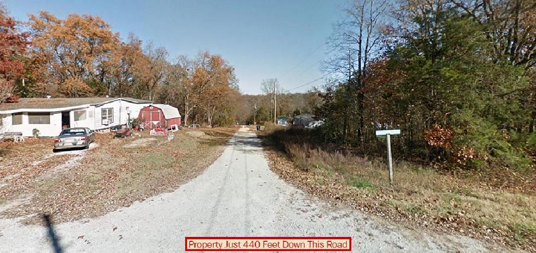 Stunning Lot Near Silver Creek Lake: .16 Acres - Property tucked away in a quiet lake town and found in the quaint community of Merriam Woods, part of the Branson area. The spacious land has few neighbors and plenty of privacy. Less than