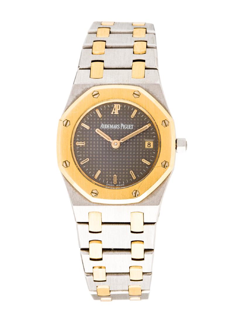Audemars Piguet Royal Oak: Stainless steel and 18K yellow gold 25mm Audemars Piguet Royal Oak watch featuring aÂ quartz movementÂ with a datecomplication, fixed bezel, grey dial and link bracelet with deployant clasp. Fits 