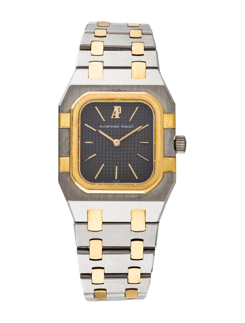 Audemars Piguet Royal Oak: 18K yellow gold and stainless steel 25mm x 33mm Audemars Piguet Royal Oak watch featuring aÂ quartz movementÂ with aÂ chronographÂ complication, smooth bezel, grey dial and link bracelet with 