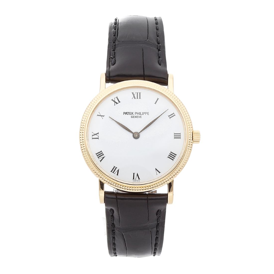 Patek Philippe Calatrava: Brand: Patek Philippe Model: Calatrava Case Size: 33 mm Movement: Mechanical (Automatic) Complications: Time Only Material: 18k yellow gold Band: New black alligator strap with an 18k yellow gold tang