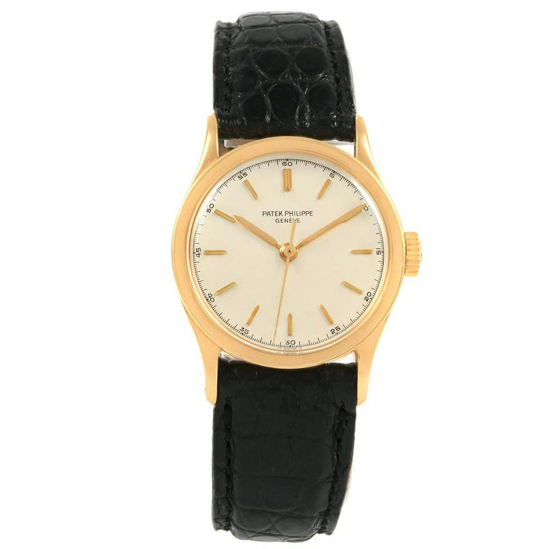 Patek Philippe Calatrava Vintage: Brand: Patek Philippe Model: Calatrava Vintage Case Size: 31.0 mm Movement: Manual-winding movement Complications: Time Only Material: 18k yellow gold Band: Black strap with generic tang buckle Box/Pa