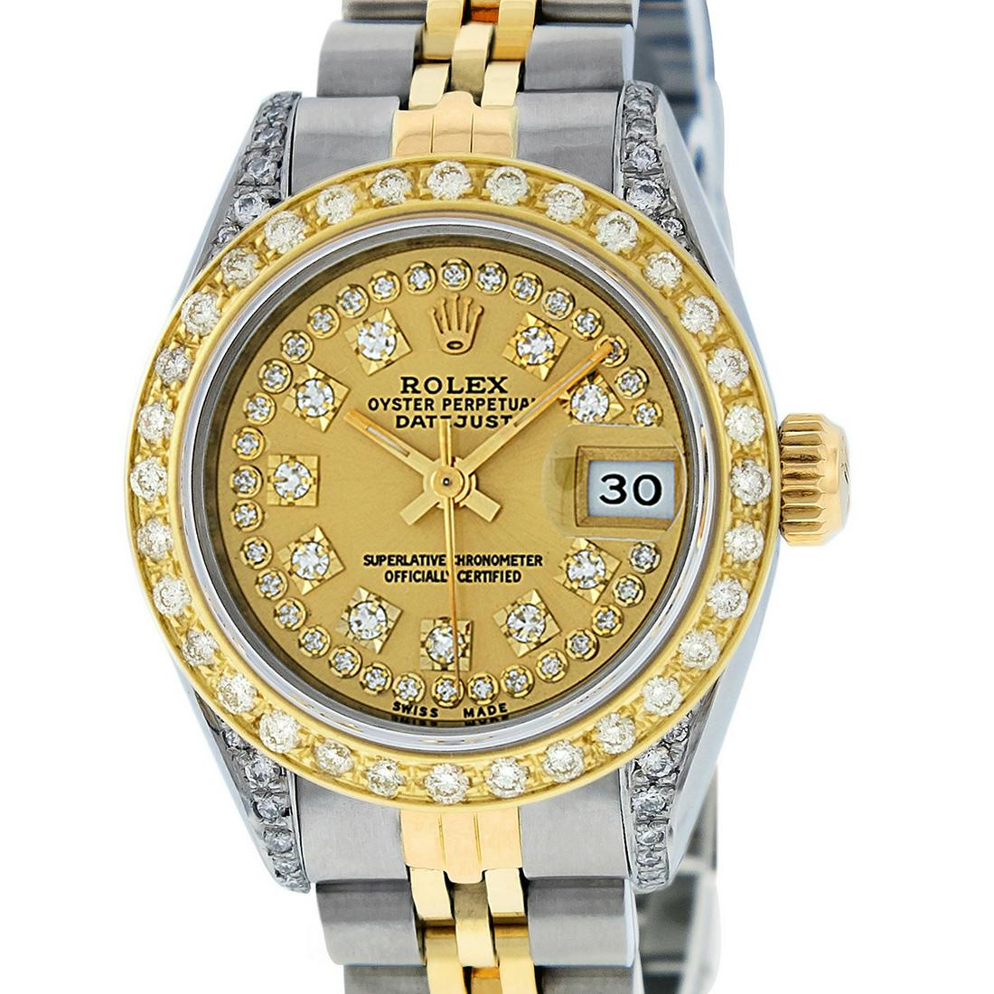 Rolex Ladies Datejust Watch SS & 18K Yellow Gold: Rolex Ladies Datejust 26mm Stainless Steel with Custom Champagne Dial set with aftermarket Genuine String Diamond Hour Markers. Custom 18K Yellow Gold Bezel with Genuine Round Diamonds. Rolex Automati