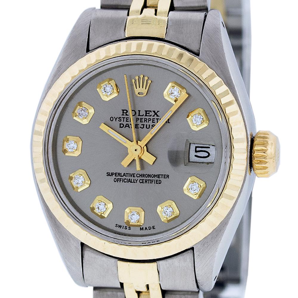 Rolex Ladies Datejust Watch SS & Yellow Gold Grey: Rolex Ladies Datejust 26mm Stainless Steel with Custom Grey Dial set with aftermarket Diamond Hour Markers. Rolex Yellow Gold Fluted Bezel. Rolex Automatic Movement with Acrylic Plastic Crystal.