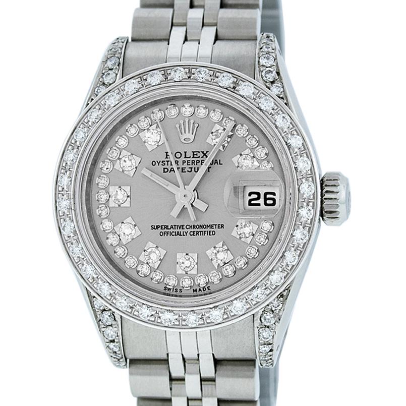 Rolex Ladies Datejust Watch SS & 18K White Gold Grey: Rolex Ladies Datejust 26mm Stainless Steel with Custom Grey Dial set with aftermarket String Diamond Hour Markers. Custom 18K White Gold Bezel with Genuine Round Diamonds. Rolex Automatic Movement wit