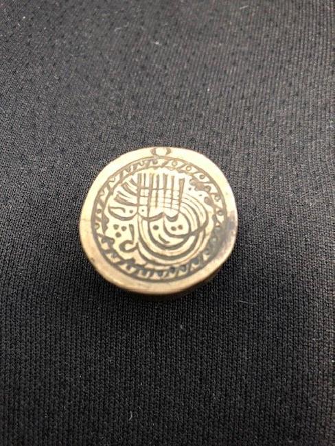 Bronze scale Seal with islamic Inscription: Bronze scale Seal with islamic Inscription, Length 1 CM. Location: United States, Beverly Hills